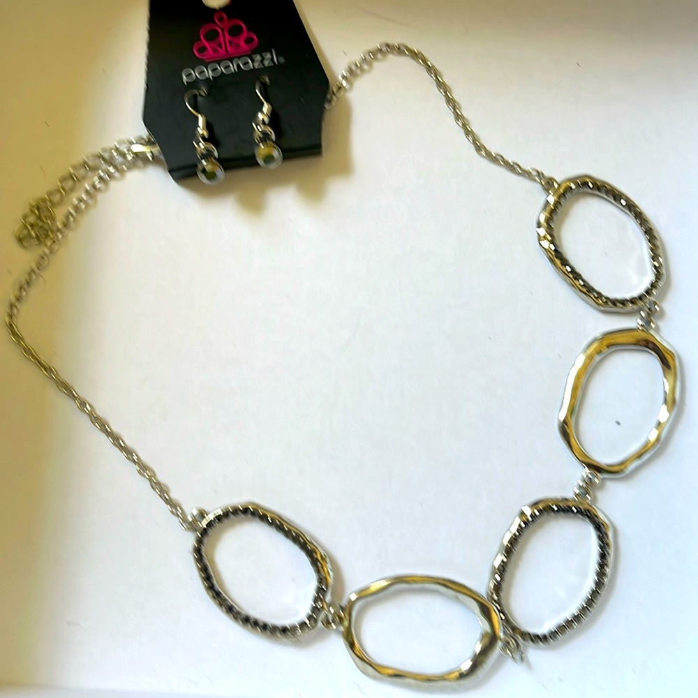 Silver necklacece with matching earrings